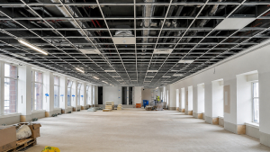 Services exposed ceiling grid installation
