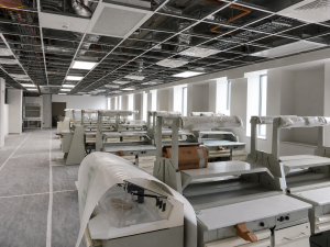 Services suspended ceiling grid with services