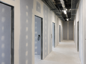 Services taped & jointed corridor walls