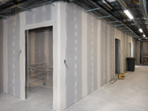 Services taped & jointed drywall walls